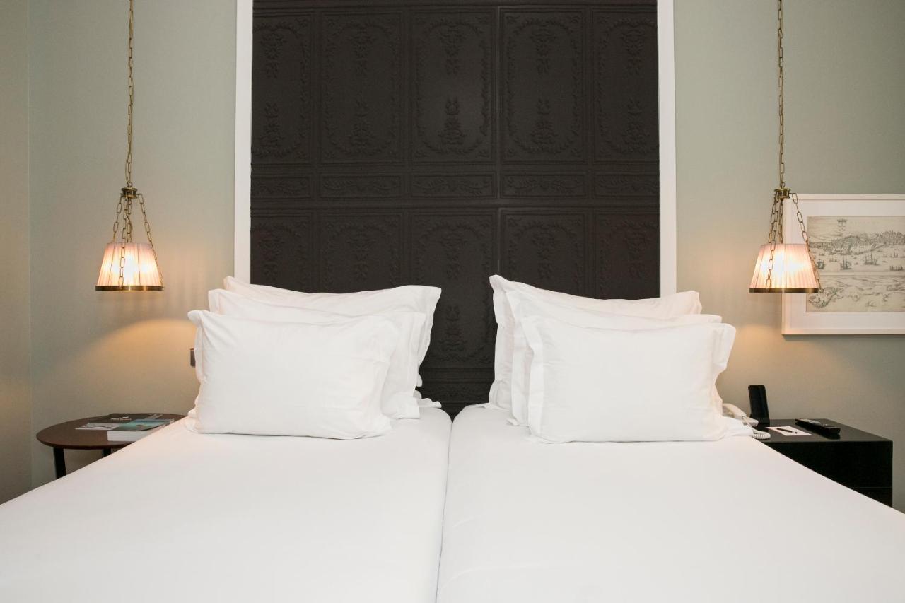 Pousada De Lisboa - Small Luxury Hotels Of The World Zewnętrze zdjęcie A bed with two pillows